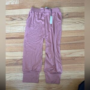 Kate Quinn the woods purple joggers